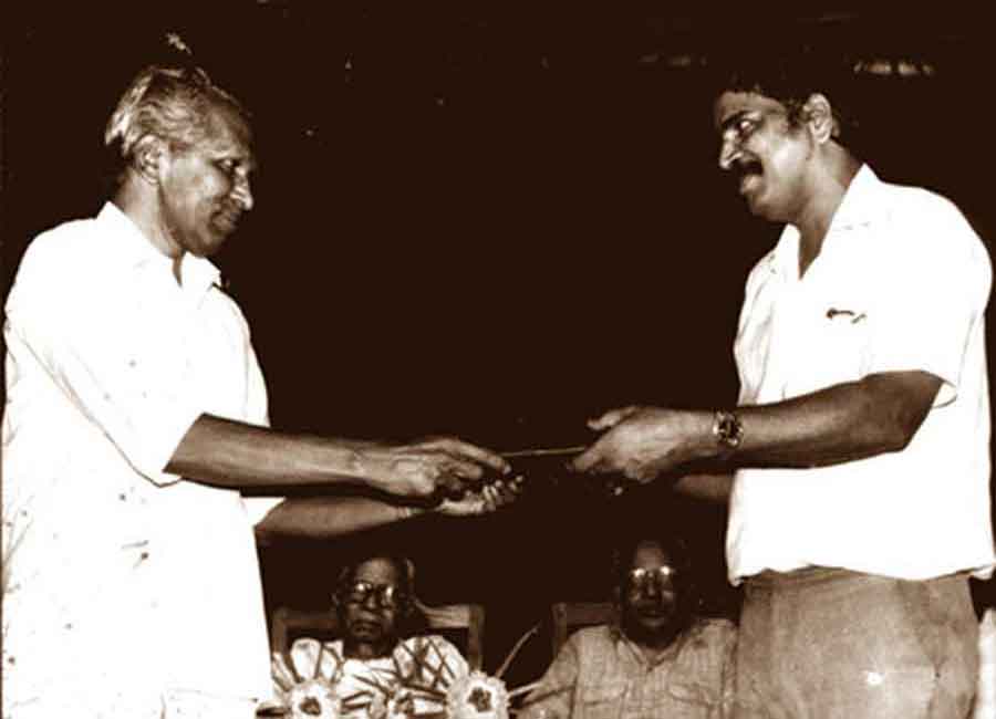 Receiving the Kerala Sahitya  Akademi Award (1988) from  Prof. M.K. Sanoo, the then  President of the Akademi.